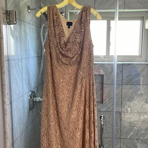 Beautiful gown size 16. Worn only once.